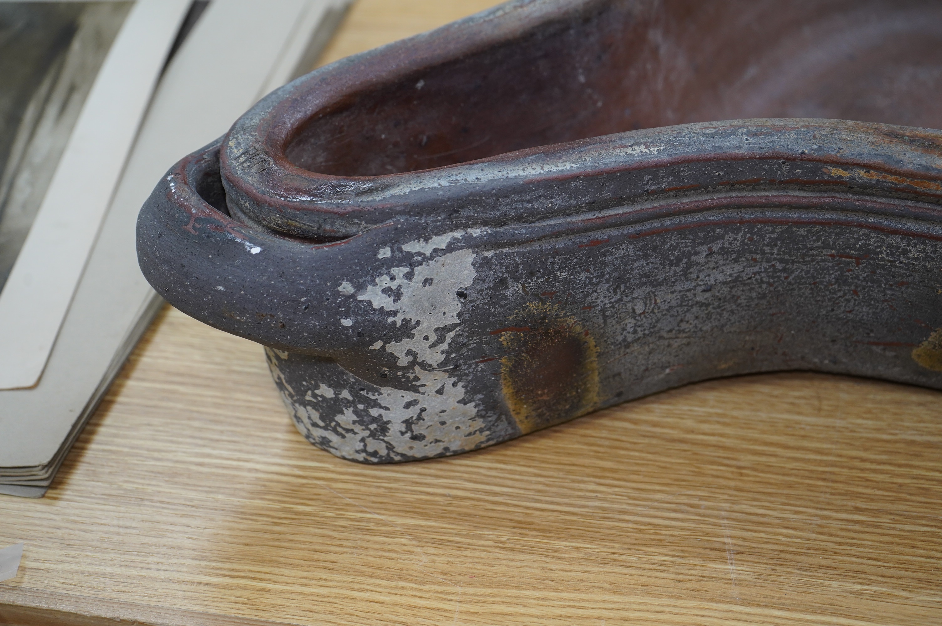 A 19th century French, ‘Saloir à Jambon’, shaped stoneware ham cooking vessel, 70cm long including handles. Stamp marks PBD to top edge and sides. Condition - good